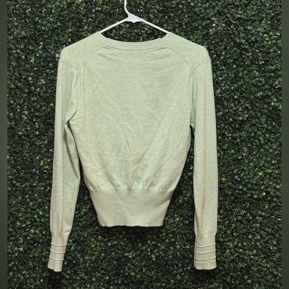 Lululemon Crossover Ribbed Waist
Sweater in Heathered Creamy Mint - Picture 7 of 12